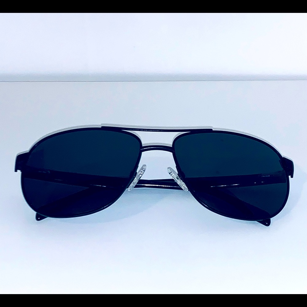 1989 Grey tint polarized unisex titanium sunglasses. Brand new. Case Unavailable